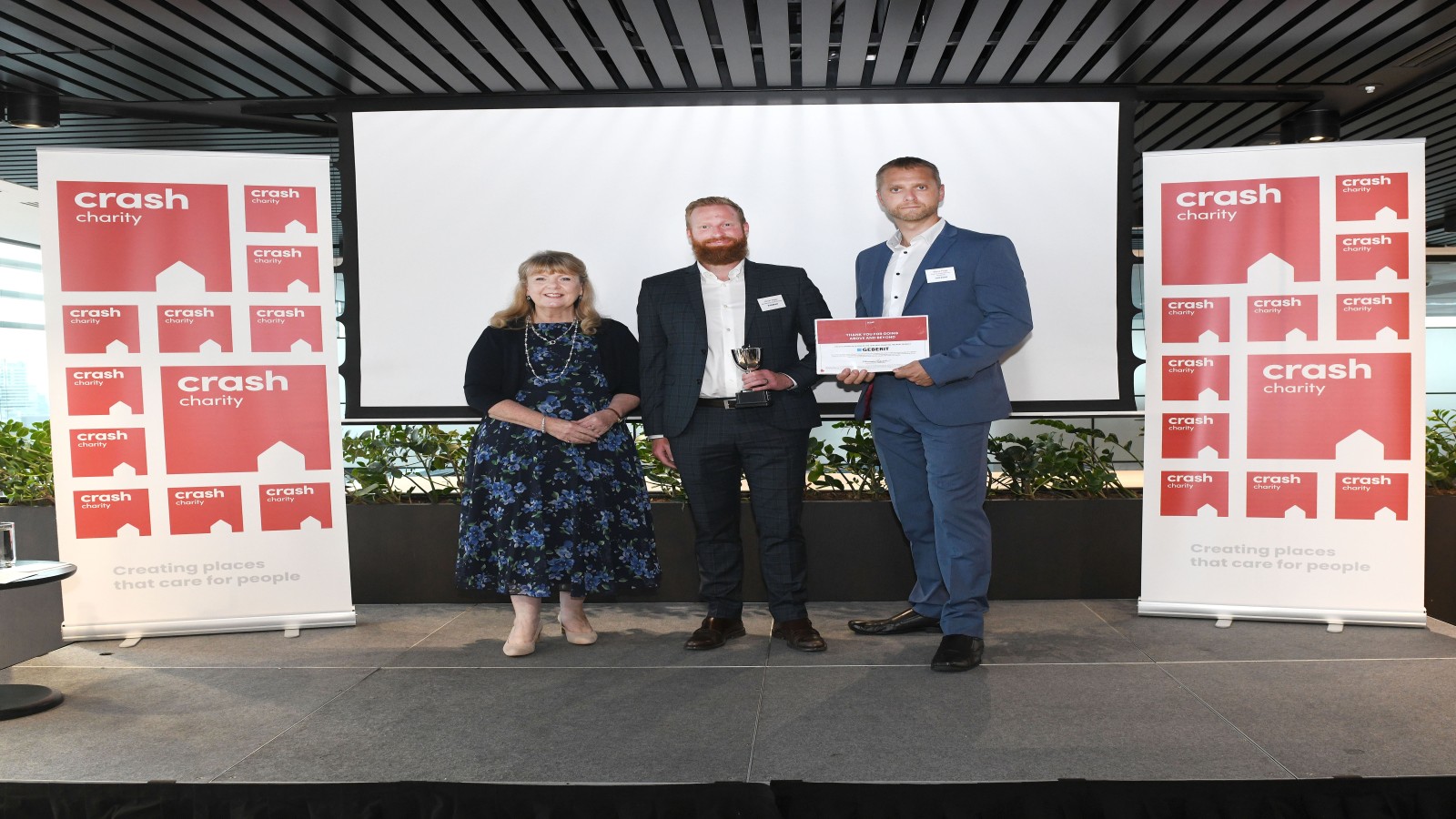 Kevin Higby and Steve Page accept CRASH award