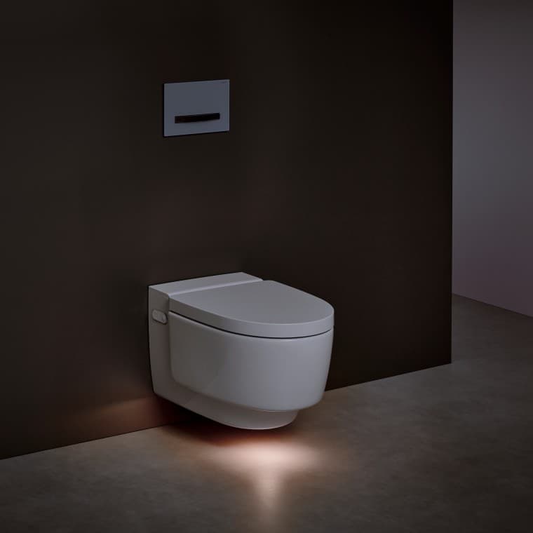 Geberit AquaClean Mera shower toilet with orientation light switched on Geberit AquaClean Mera shower toilet with orientation light switched on